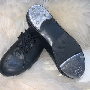 Tap shoes lace up about size 1.5 street shoe.